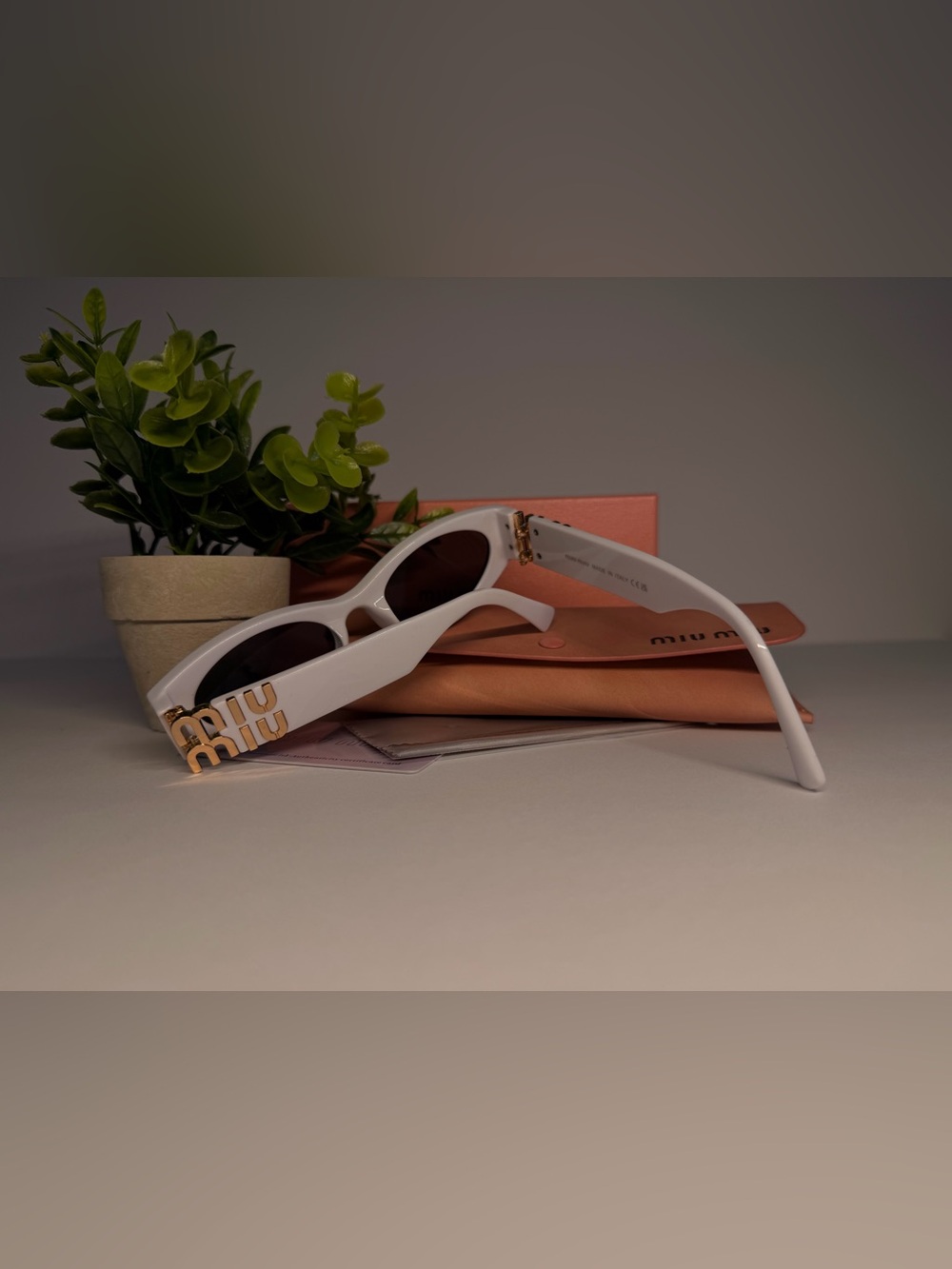 Miu Miu White Frame Sunglasses with Gold Logo Accent